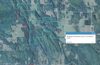 A map of the 645-acre Harris Working Forest Reserve, outlined in blue. 